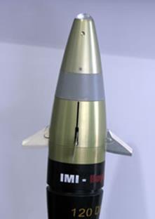 The forward section of IMI's 120mm GPS/Laser guided mortar bomb showing control fins and seeker. Photo: Defense Update